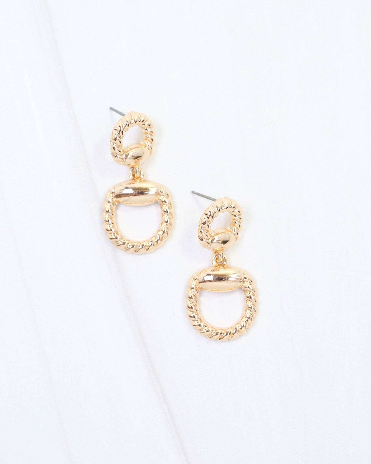 Gold braided horsebit drop earrings with twisted rope texture and stud backs