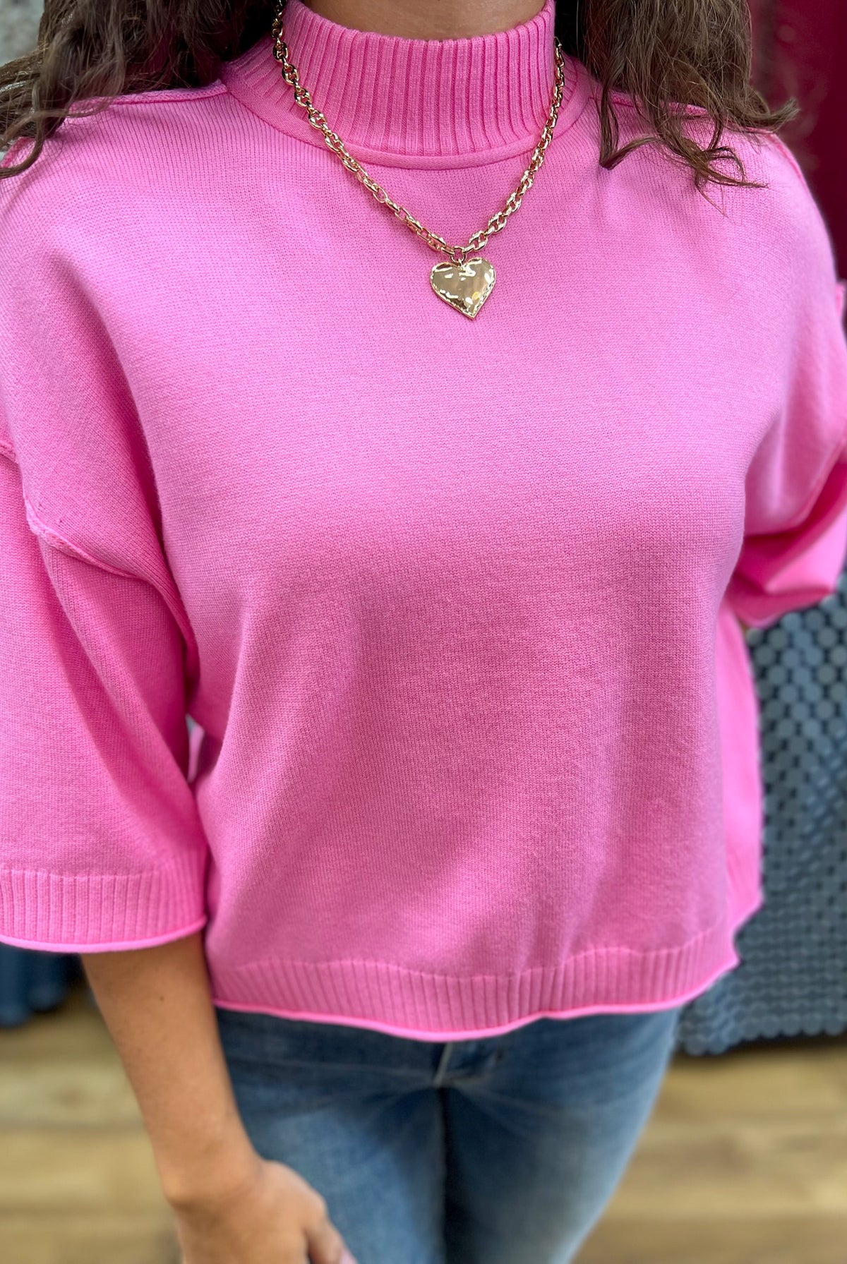 Glam pink mock neck knit sweater with 3/4 sleeves and ribbed trim