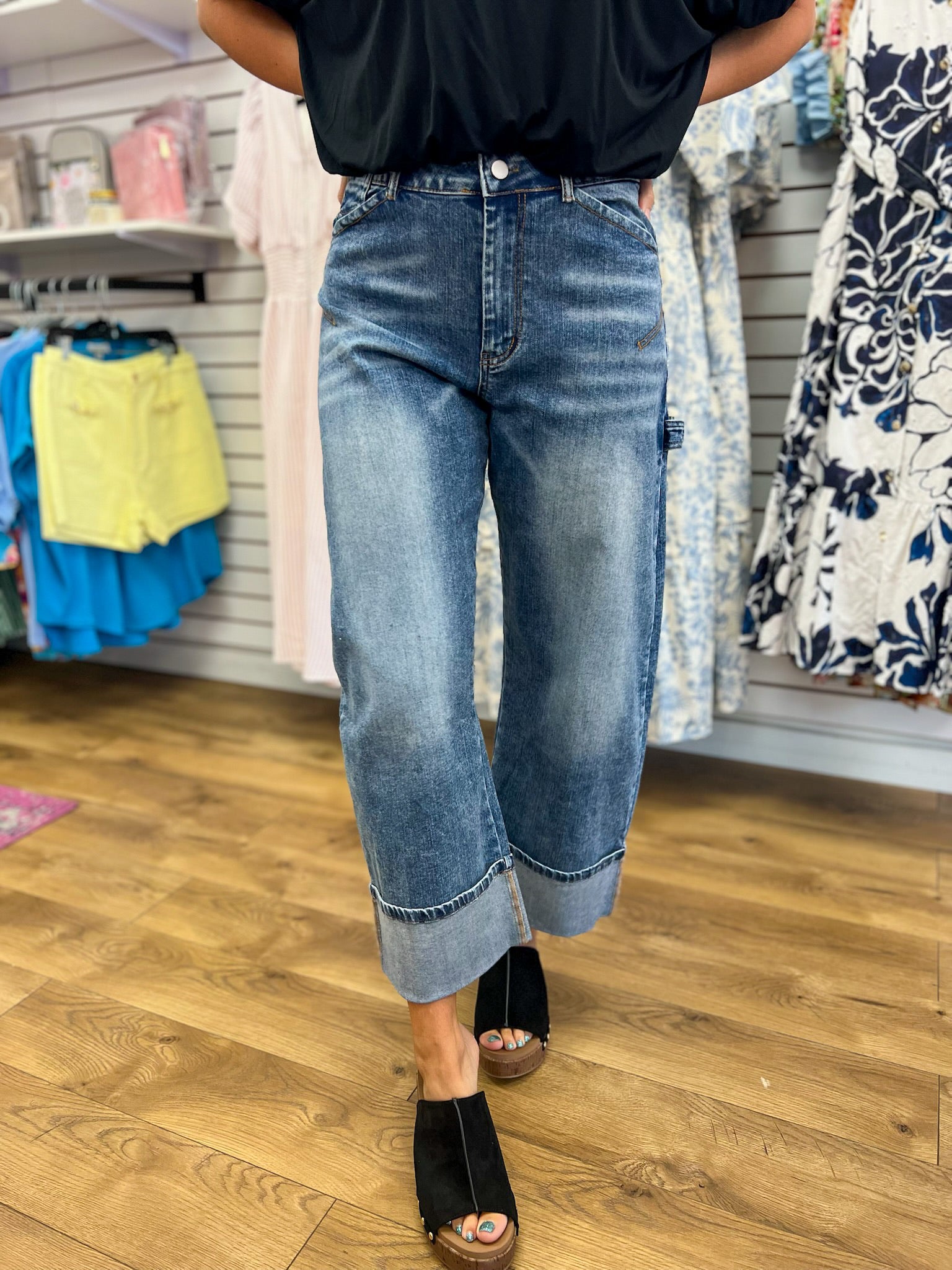 Stonewashed medium blue straight leg cropped jeans with cuffed hem and hammer loop detail