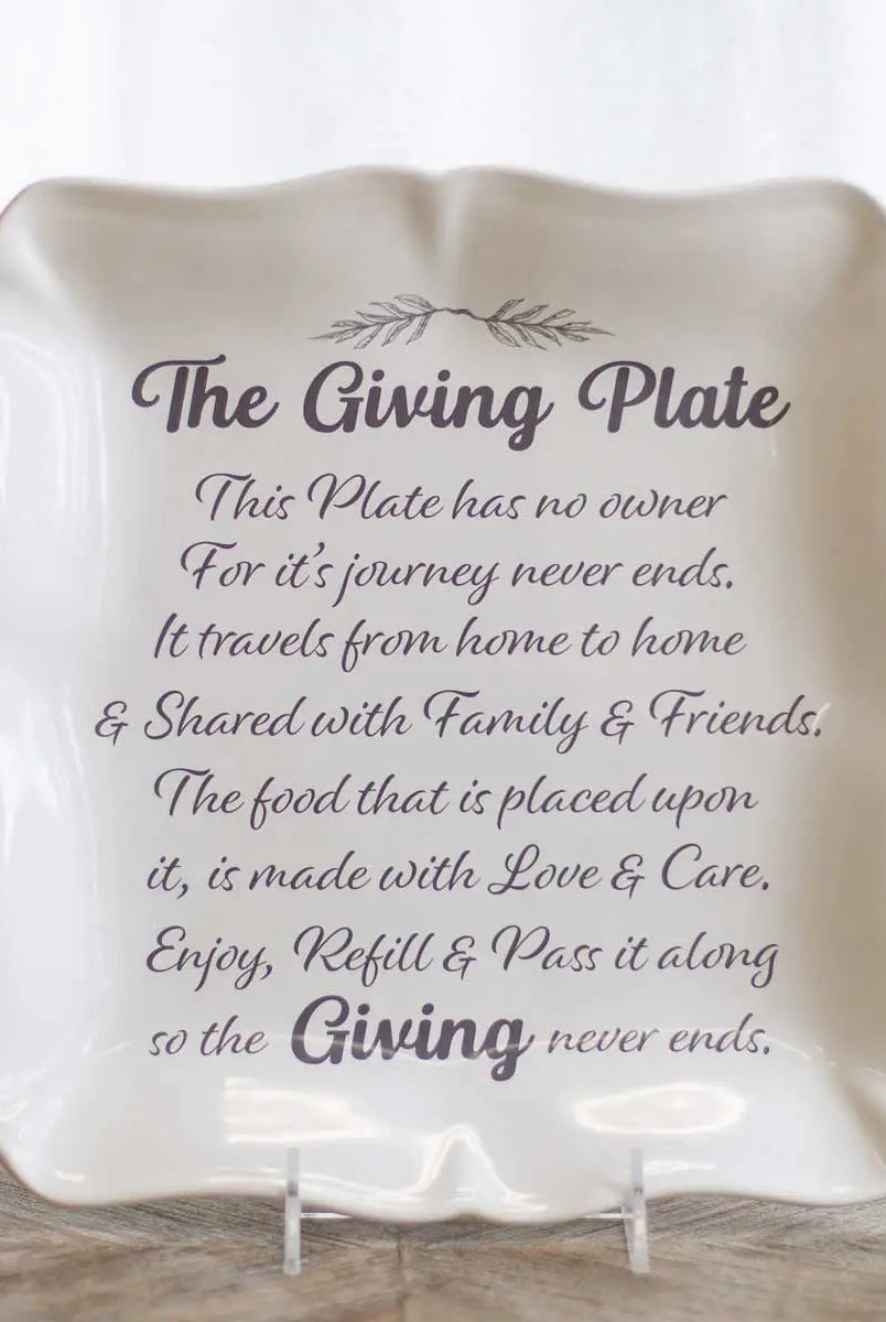 White square ceramic platter with scalloped edges and The Giving Plate sentiment text
