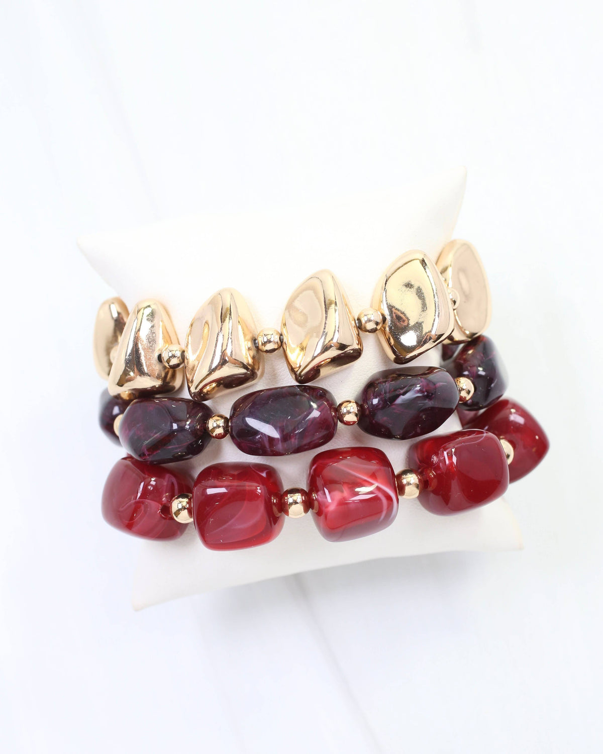 Rayna burgundy beaded bracelet set by Caroline Hill with gold accents, three stackable bracelets