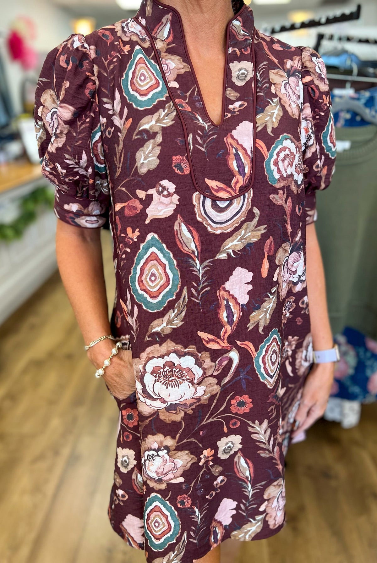 Wine floral V-neck shift dress with short puff sleeves and paisley print