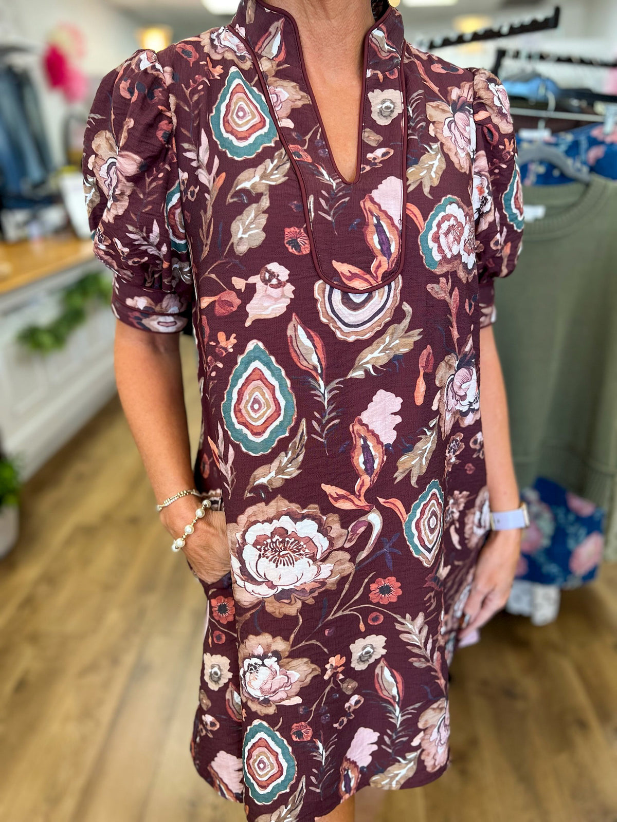 Wine floral V-neck shift dress with short puff sleeves and paisley print