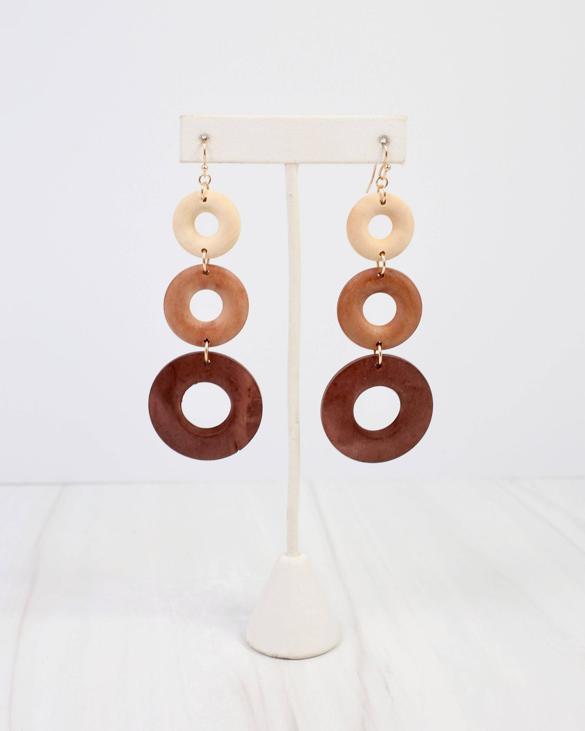 Caroline Hill Florence three-tier natural wood ring dangle earrings in ombre brown tones