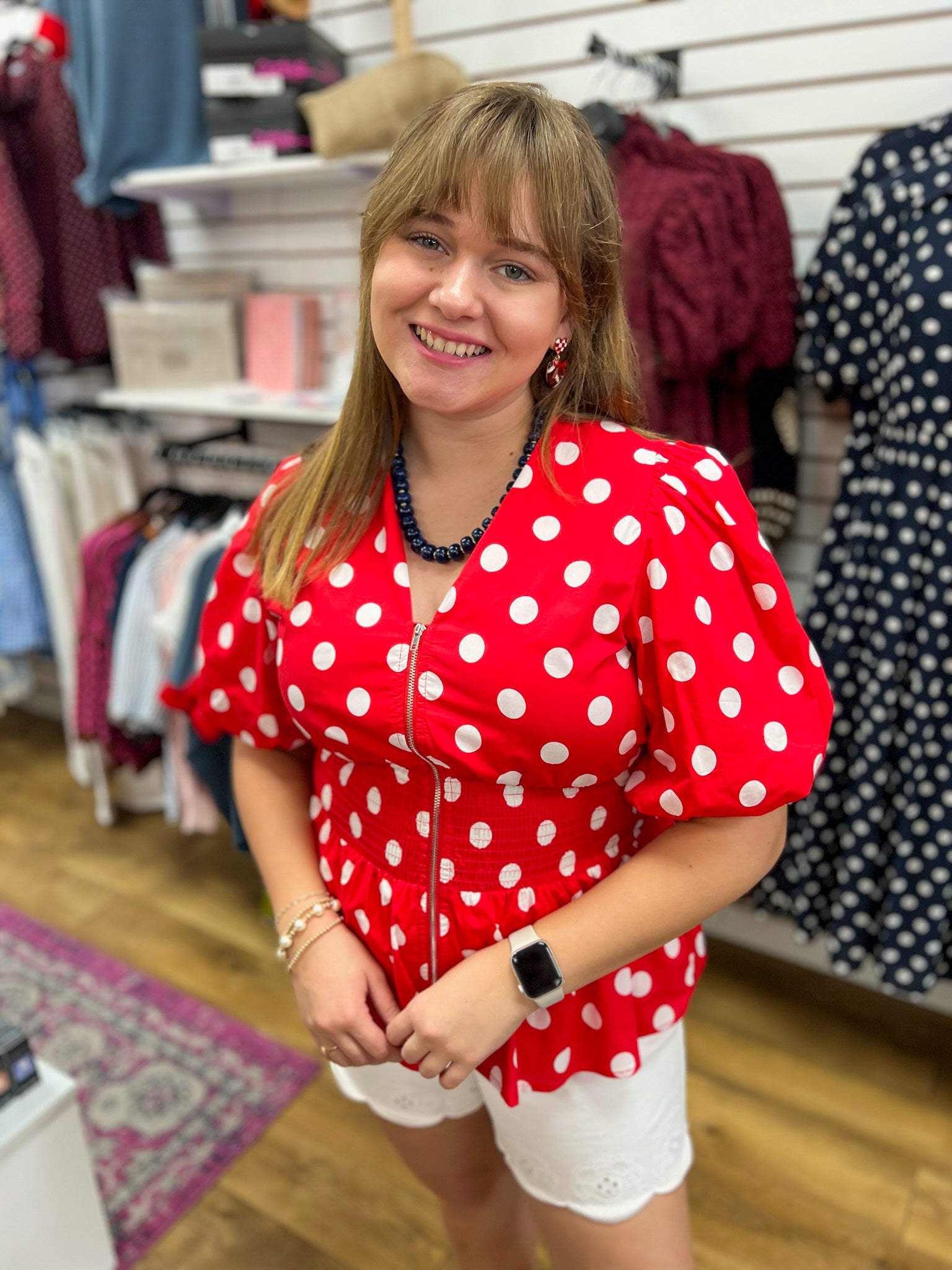She + Sky red polka dot puff sleeve top with front zipper closure