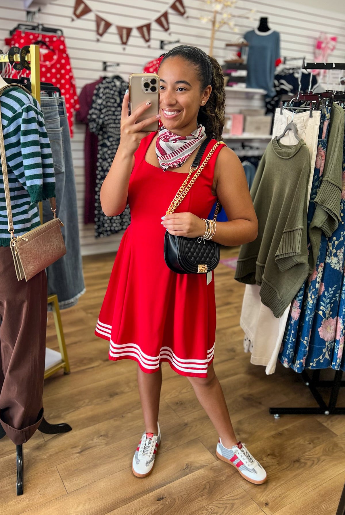 Red sleeveless square neck dress with white contrast stripe trim at hem