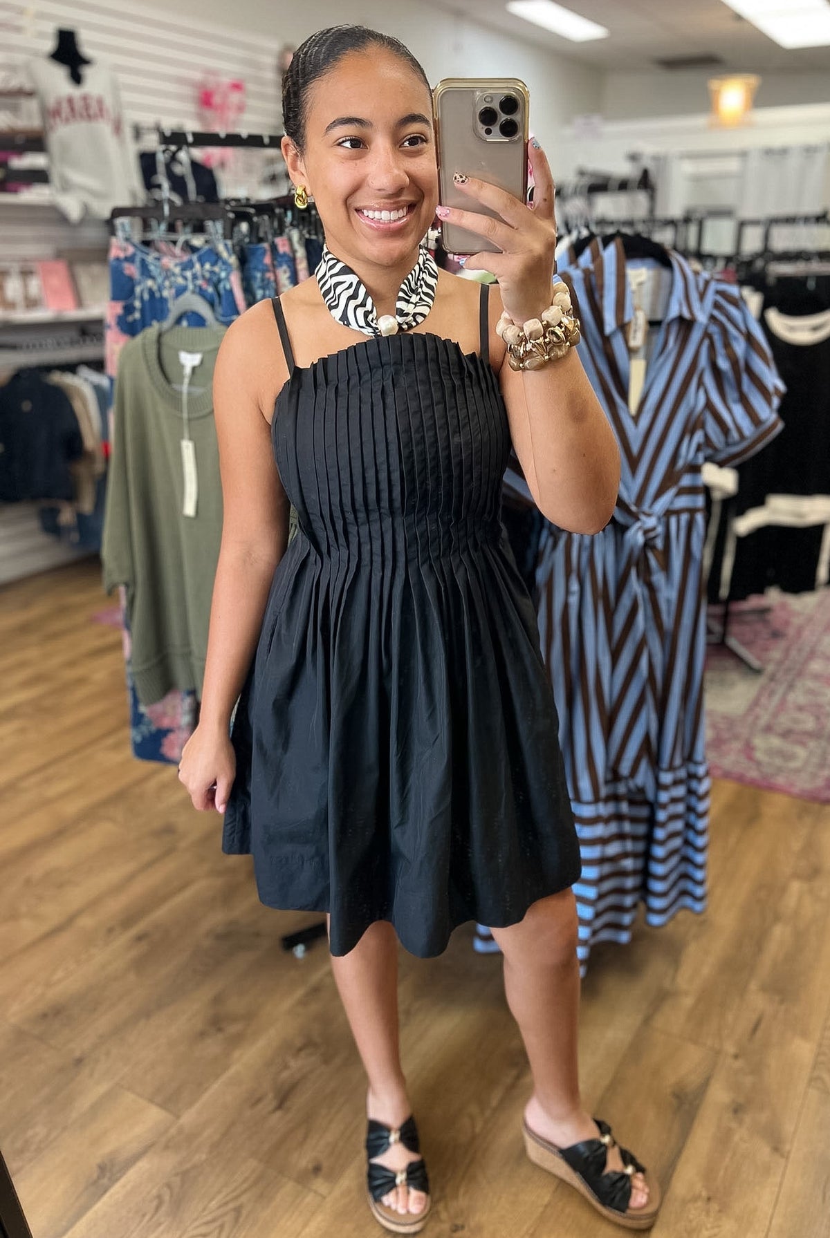 Entro black pleated bodice mini dress with adjustable spaghetti straps and full skirt