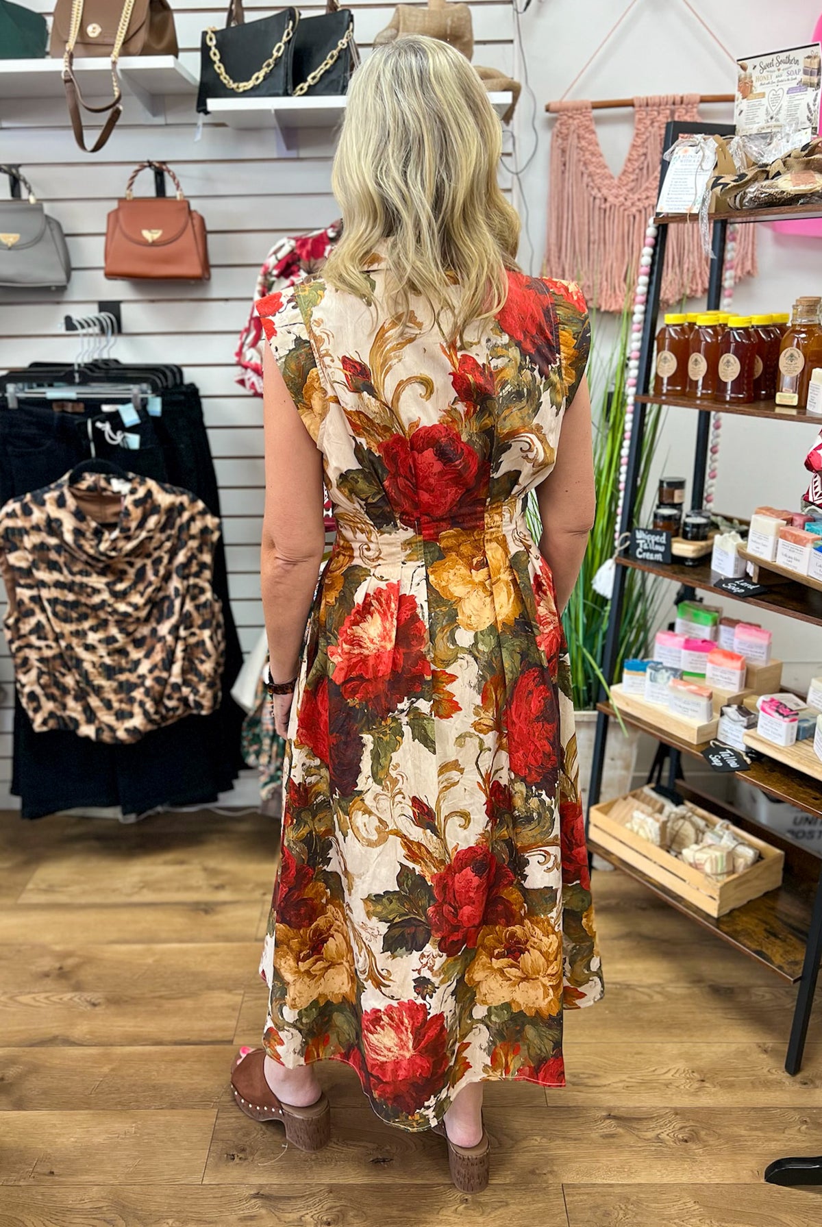 Entro cream midi dress with bold red and gold floral print, sleeveless, midi length