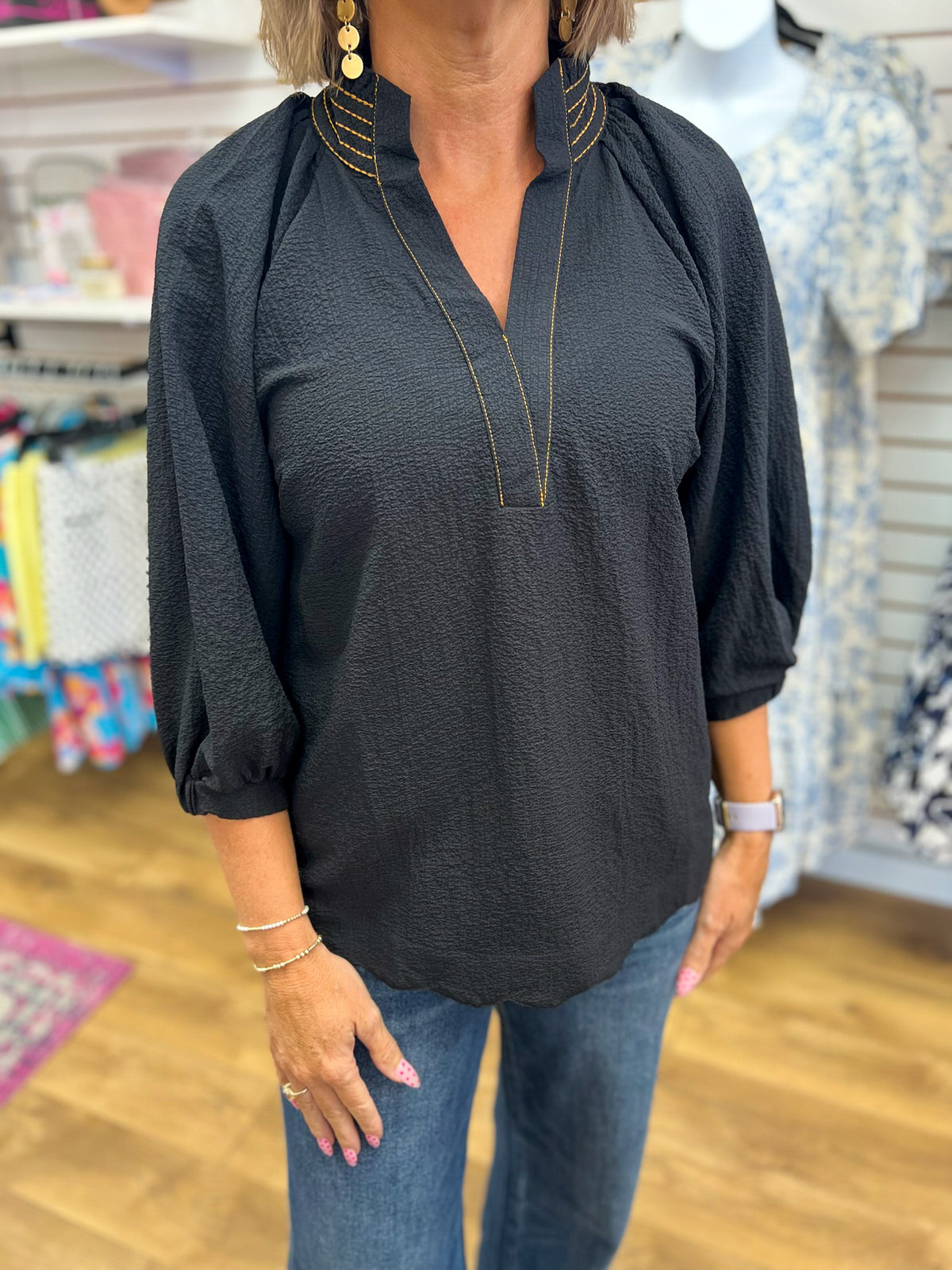 Umgee black textured V-neck top with gold trim detail and 3/4 balloon sleeves