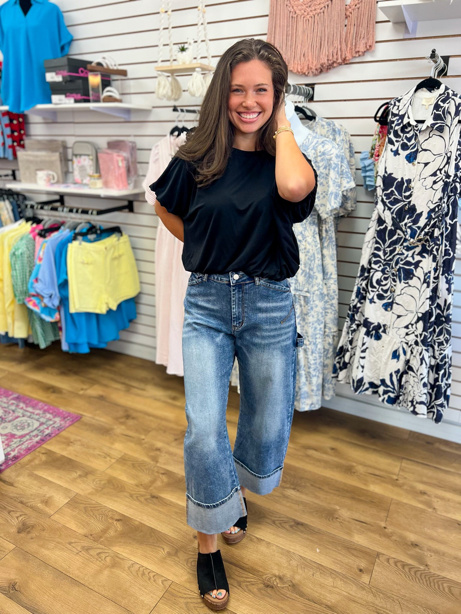 EE:Some stonewashed wide-leg cropped jeans with cuffed hem, medium blue wash