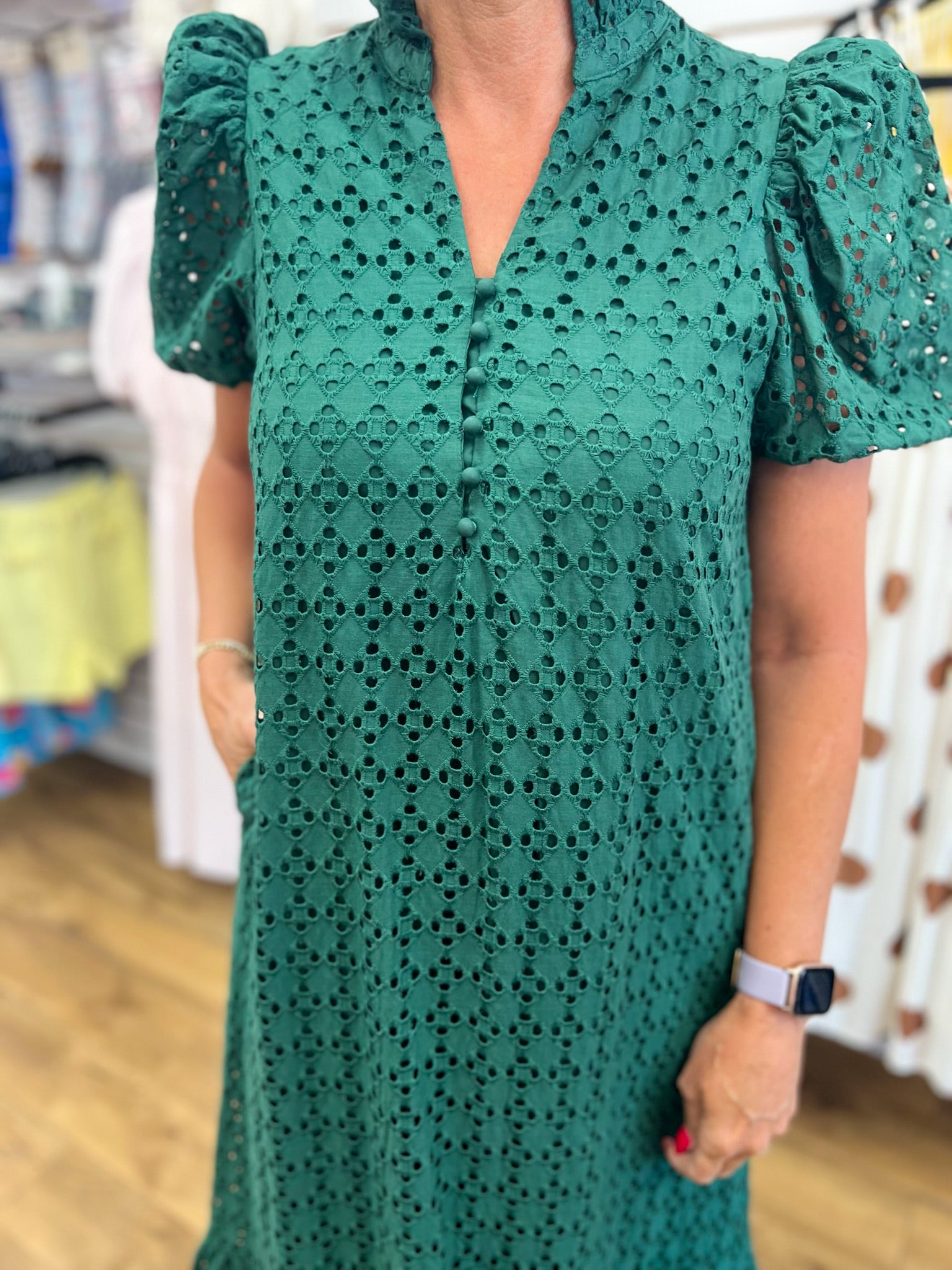 Hunter green eyelet lace midi dress with puff sleeves and button V-neck