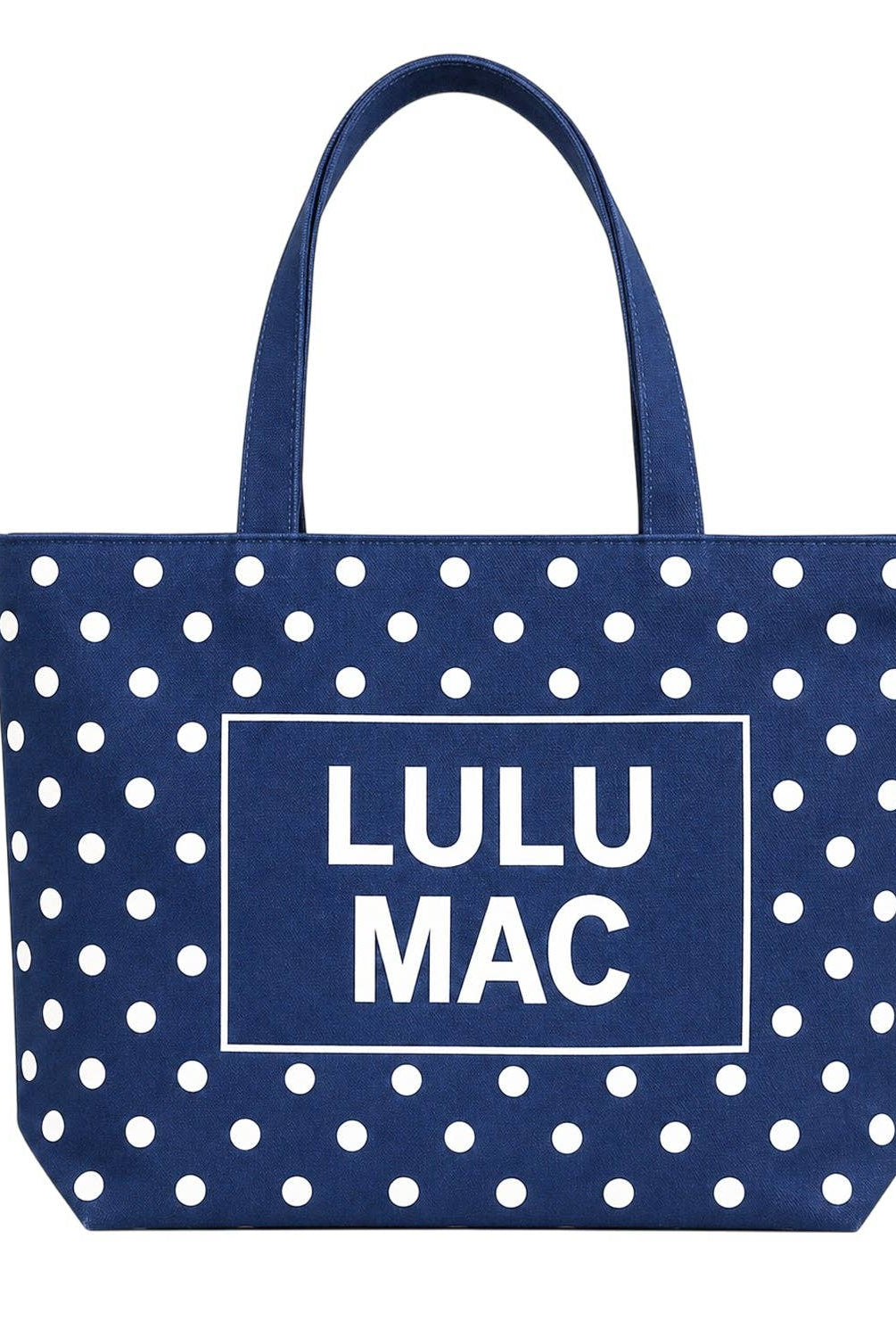 Navy blue polka dot canvas tote bag with white Lulu Mac logo and handles