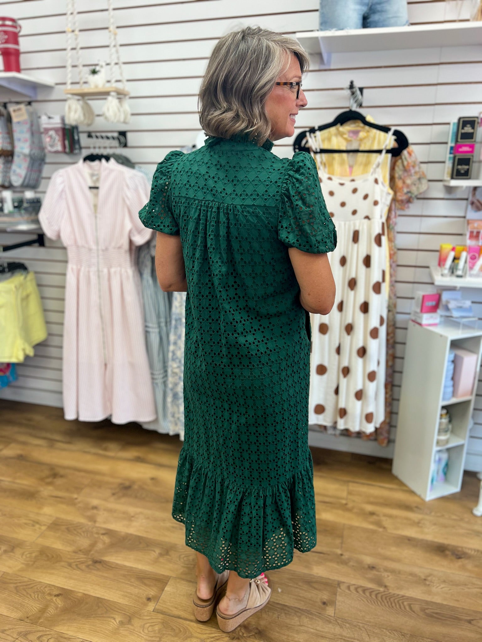 Hunter green eyelet lace midi dress with short puff sleeves and ruffle hem