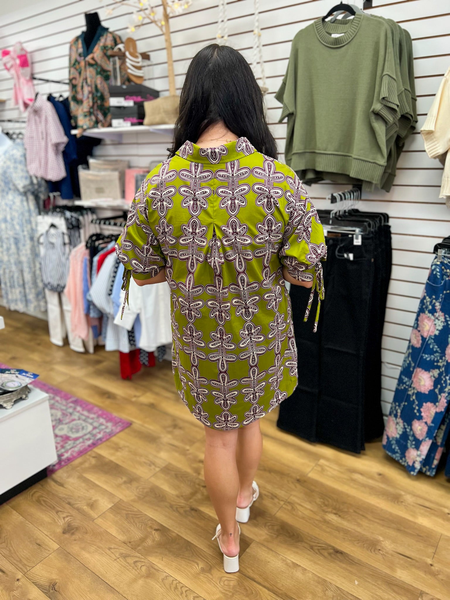 Olive green printed shirt dress with short puff sleeves and tie detail