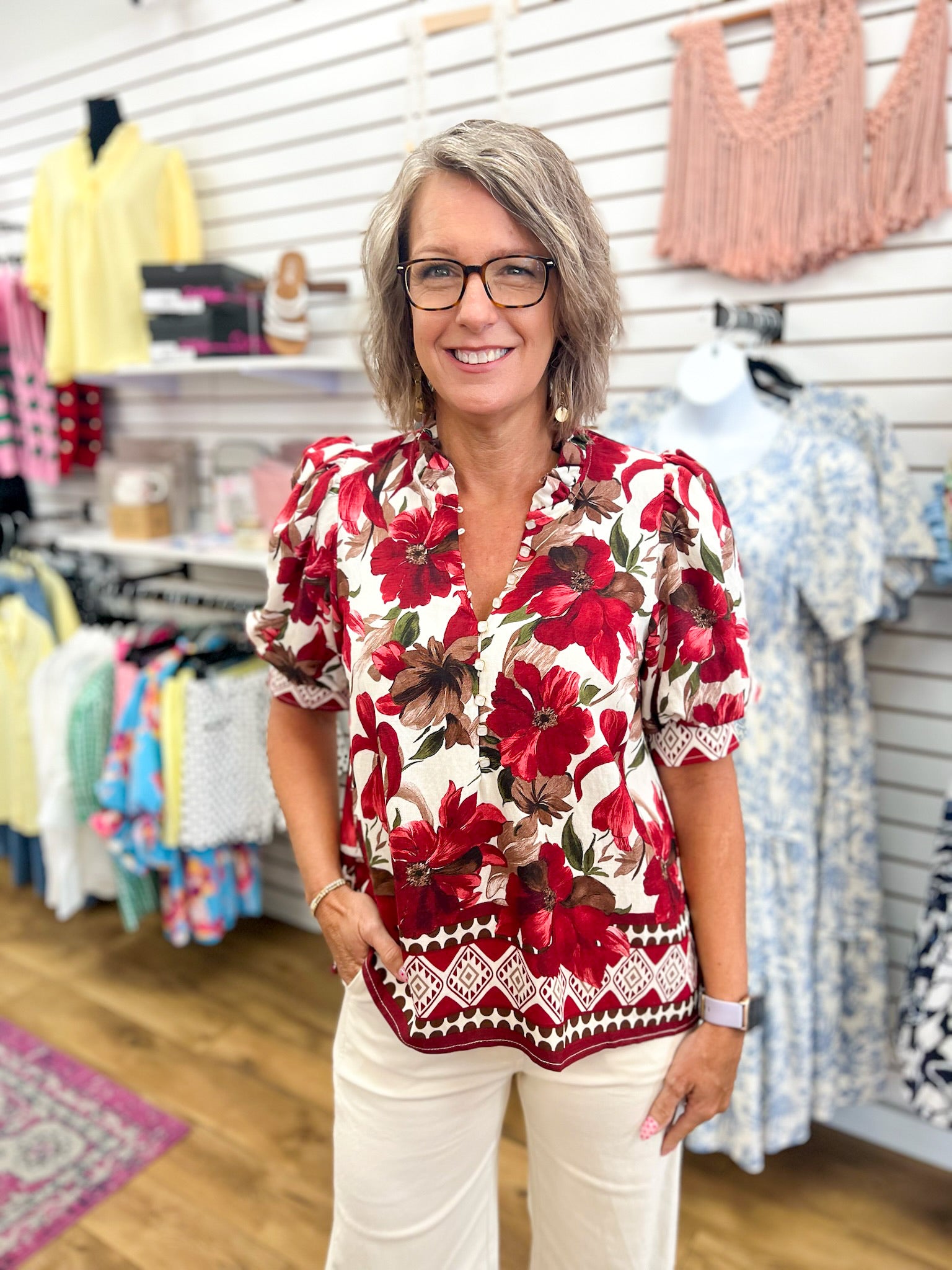 Burgundy floral puff sleeve top with ruffle V-neck and border hem detail