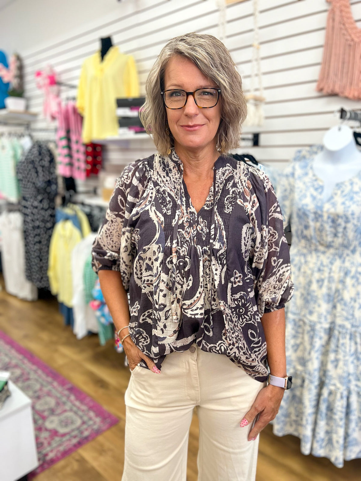 Umgee black paisley boho top with 3/4 puff sleeves and smocked neckline