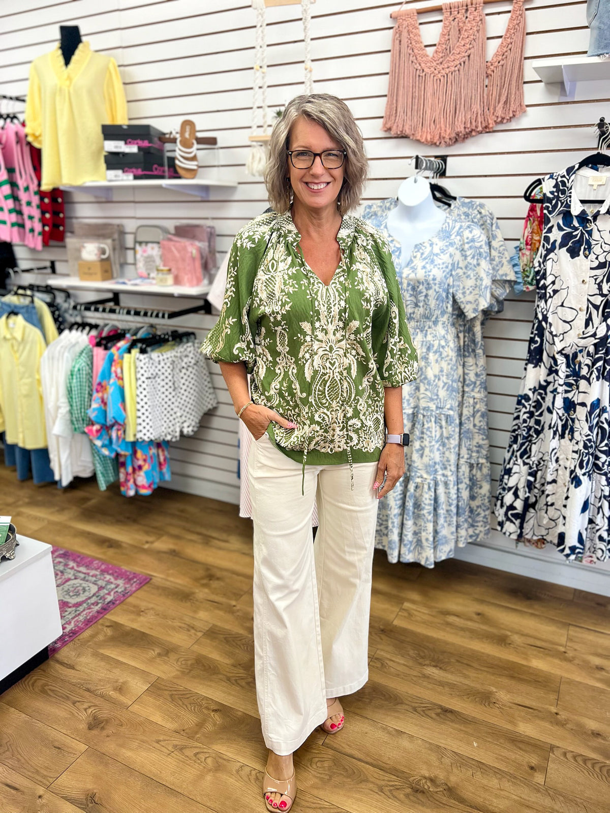 Olive green boho border print top with 3/4 balloon sleeves and cream floral pattern