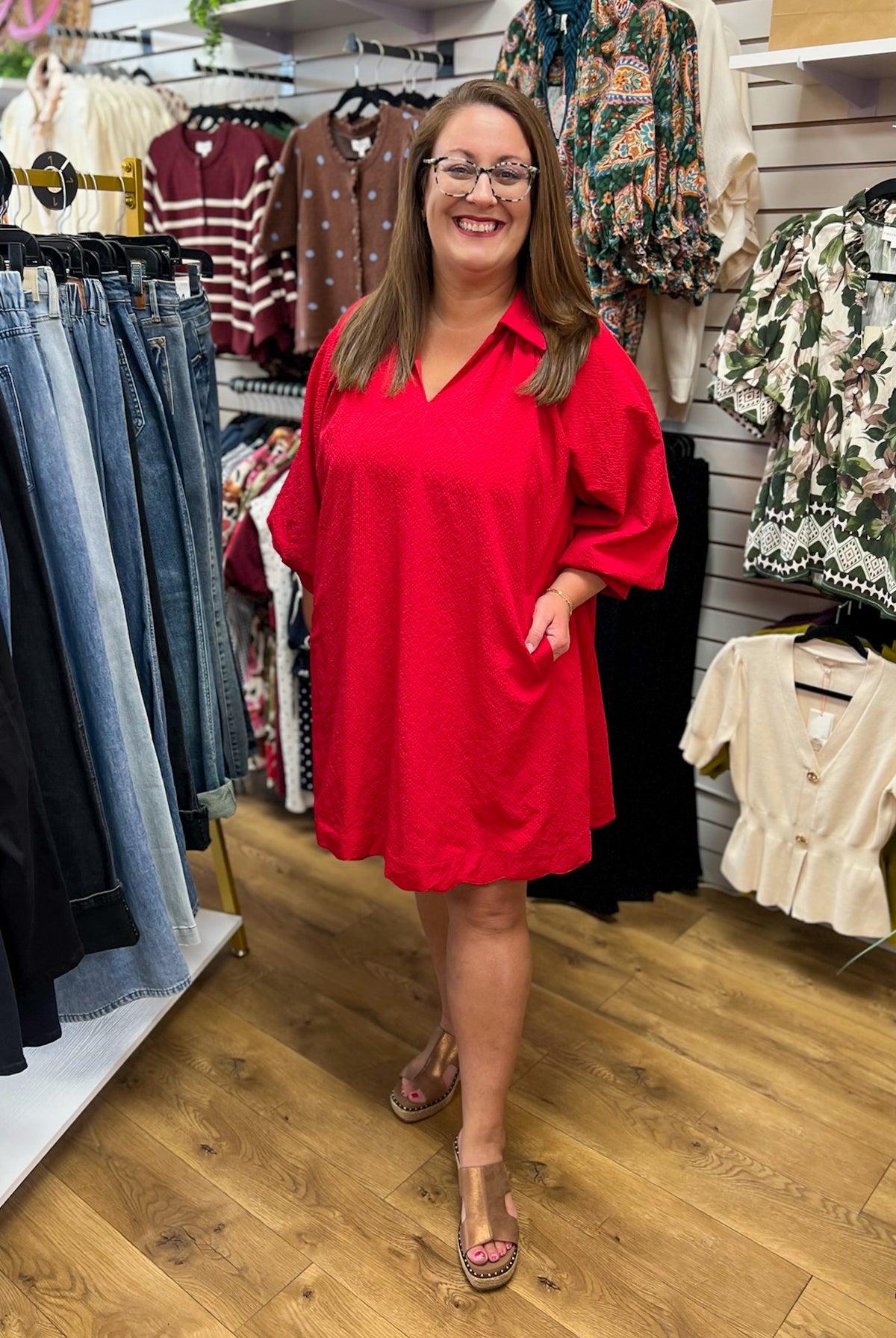 Red V-neck collared dress with 3/4 bubble sleeves and scalloped hem