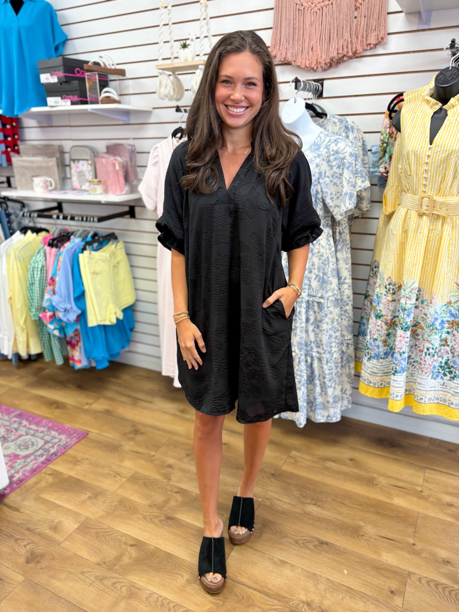 Black jacquard tonal V-neck dress with elbow length sleeves and side pockets