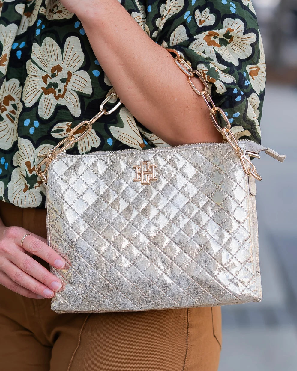 Caroline Hill quilted metallic champagne crossbody bag with gold chain strap