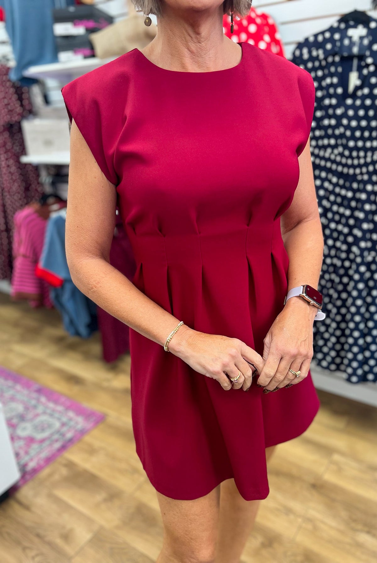 Glam burgundy sleeveless A-line dress with pleated waist and cap shoulders
