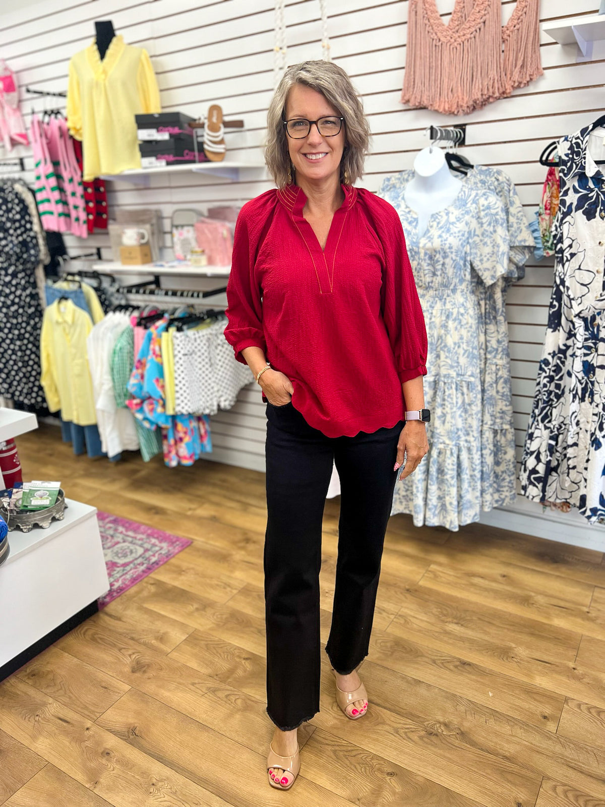 Wine red V-neck top with 3/4 balloon sleeves and scalloped hem
