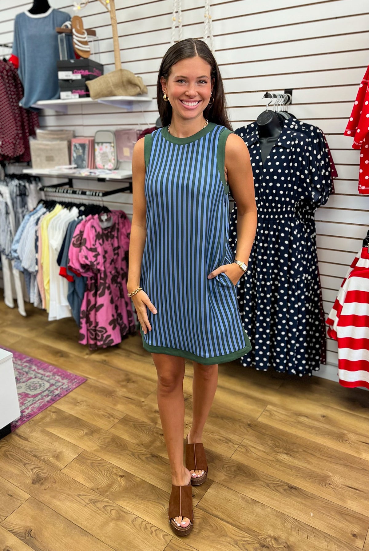 Hunter green and blue vertical striped sleeveless mini dress with pockets