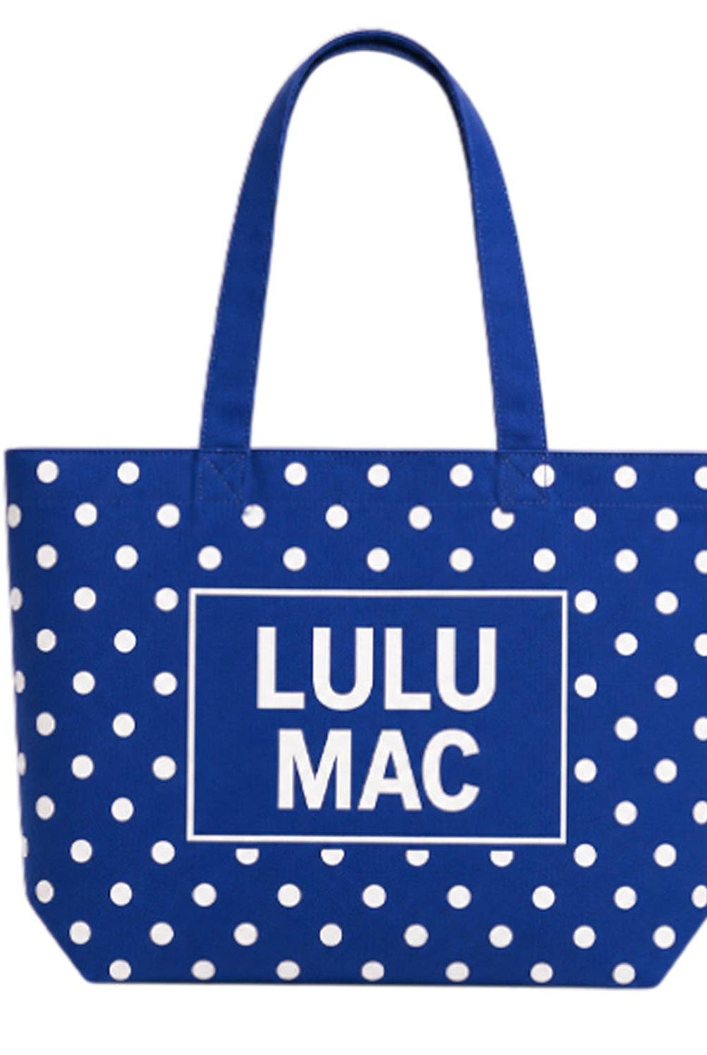 Royal blue polka dot canvas tote bag with white LULU MAC logo and handles