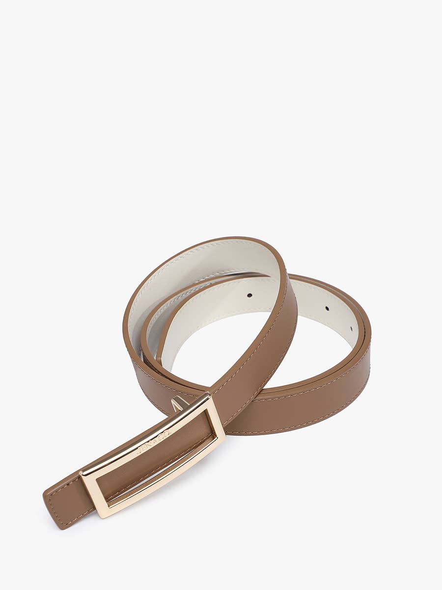 Tan and white reversible leather belt with gold rectangular frame buckle