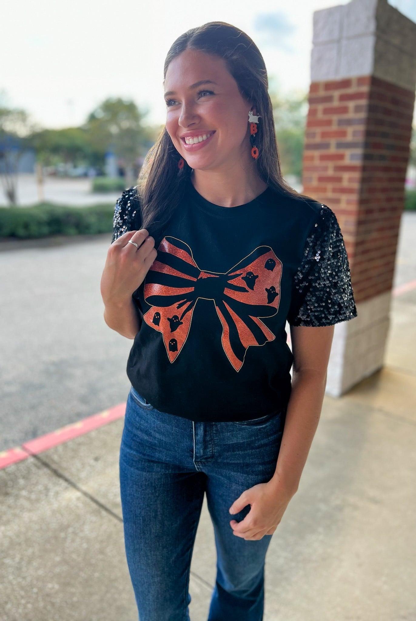Spooky Season Black Halloween Top with Orange Graphic Bow and Sequin Puff Sleeves - A'Bekah's Boutique