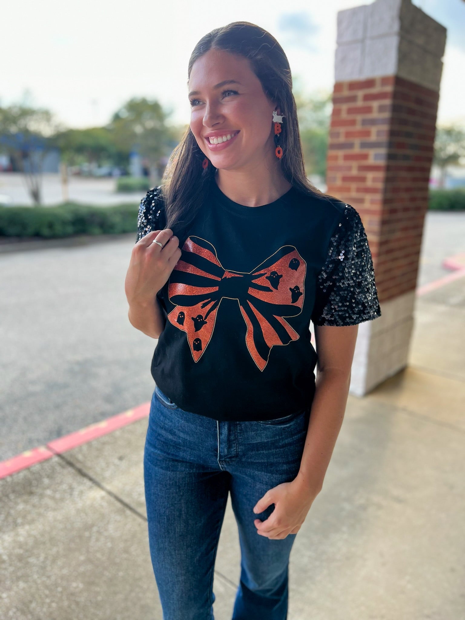Spooky Season Black Halloween Top with Orange Graphic Bow and Sequin Puff Sleeves - A'Bekah's Boutique