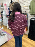 Wine polka dot short dolman sleeve top with pink collar, back view