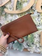 Camel faux leather wristlet clutch purse with gold hardware and removable strap