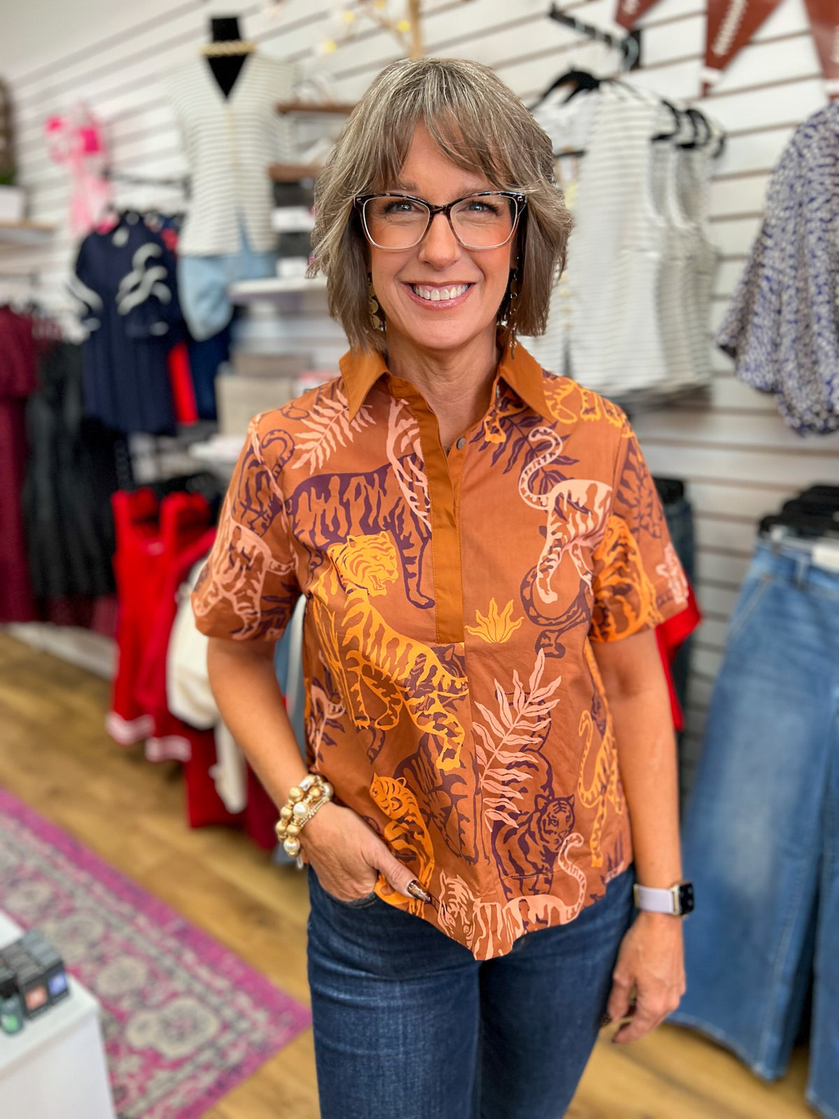 Entro brown tiger print short sleeve collared top with snap placket