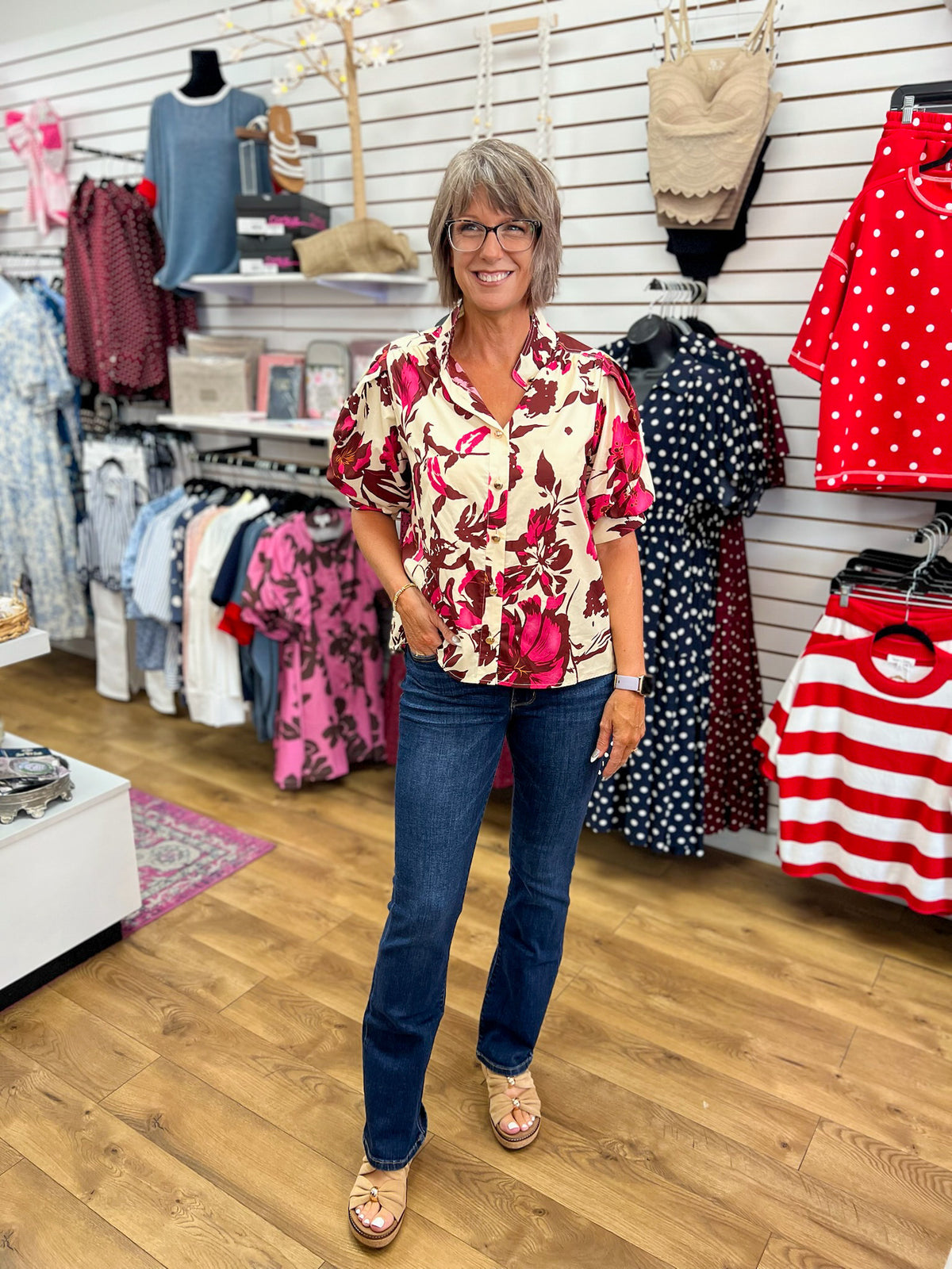 Entro wine floral button-front top with short puff sleeves on model with jeans