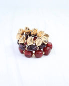 Three-piece bracelet set with burgundy beads and gold nugget and ball accents