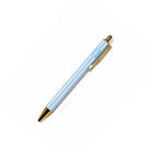 Light blue and white striped ballpoint pen with gold metal accents by Lulu Mac