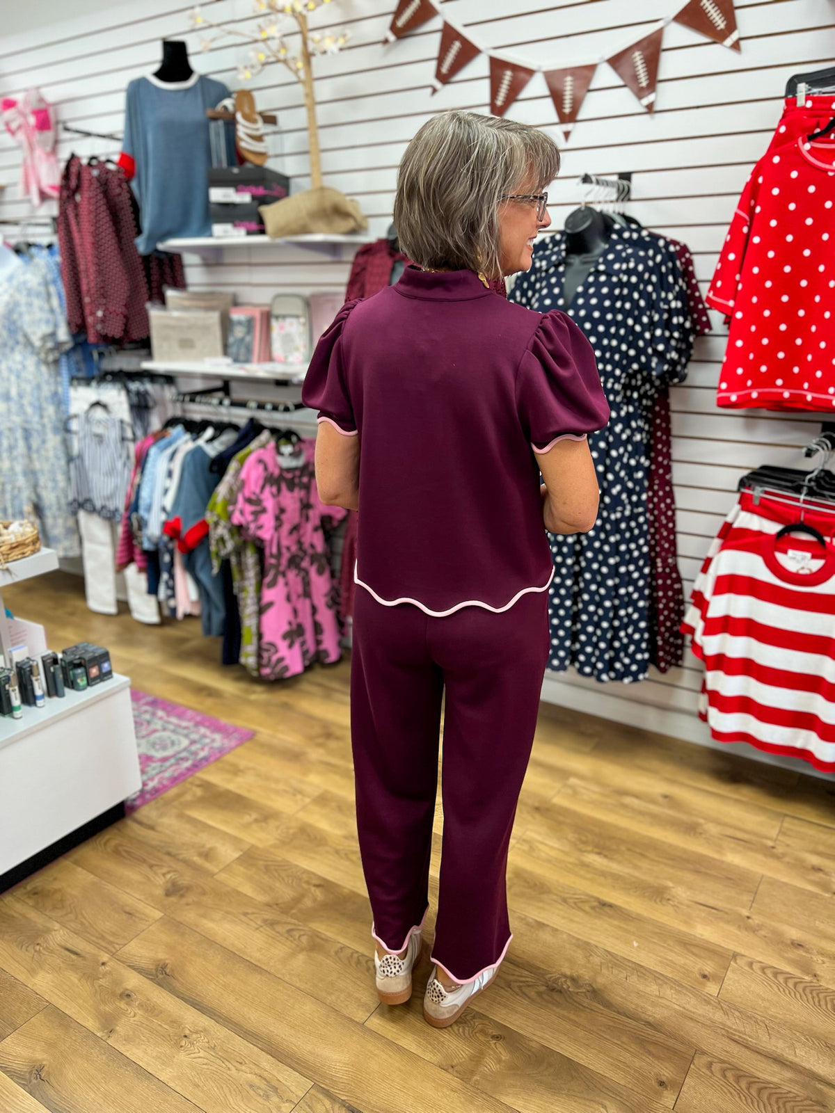 Plum puff sleeve v-neck pant set with pink scallop trim, back view