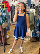 Navy blue sleeveless square neck dress with white contrast stripe hem trim
