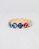 Multicolor rhinestone stretch bracelet with gold-tone settings in pink blue green and clear