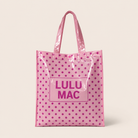 Light pink glossy tote bag with hot pink polka dots and Lulu Mac logo