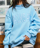Sky blue oversized mockneck sweatshirt with Psalms 46:5 striped embroidered lettering