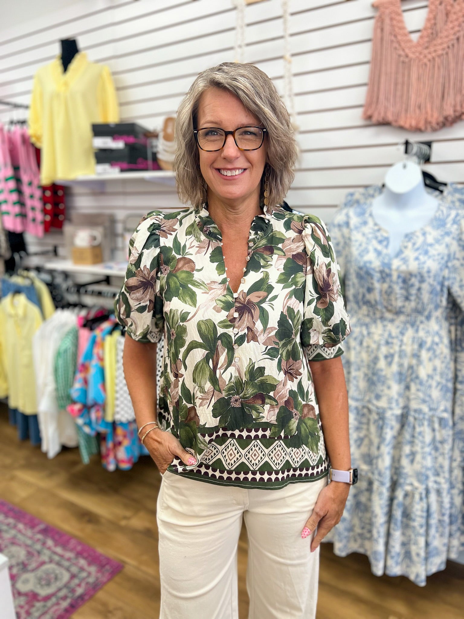 Ivory floral puff sleeve top with green botanical print and border hem detail