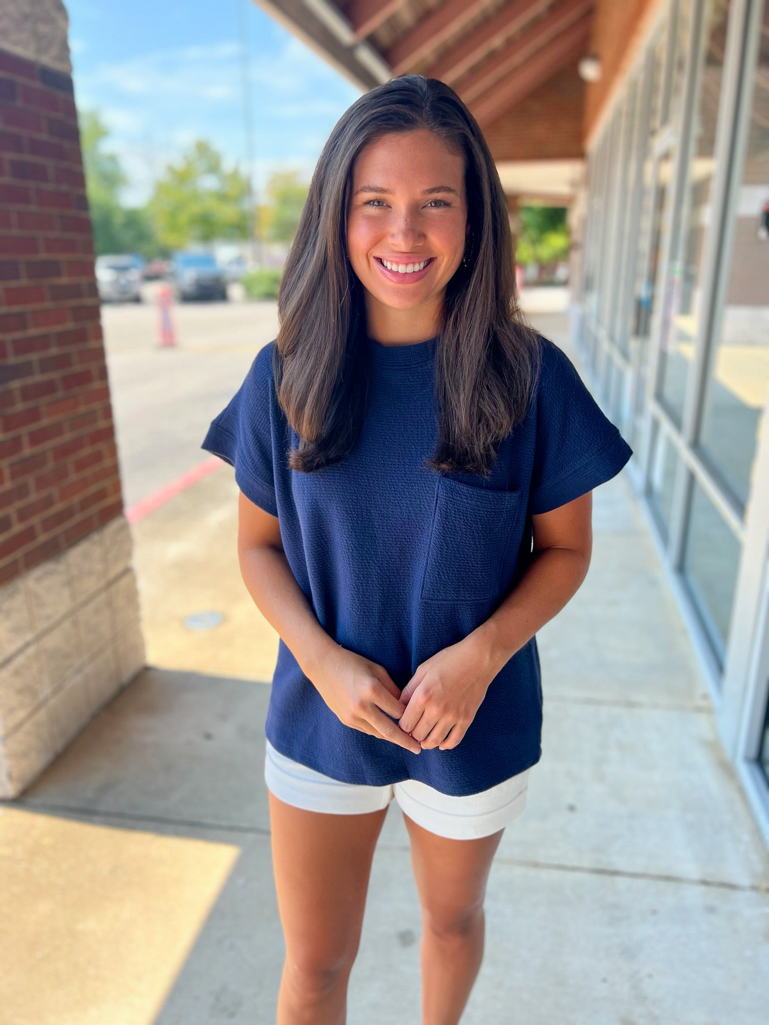 Short sleeve navy top cloudy knit round neckline pocket