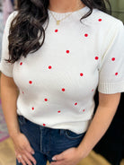 EE:Some white short sleeve knit sweater with red polka dot embroidery
