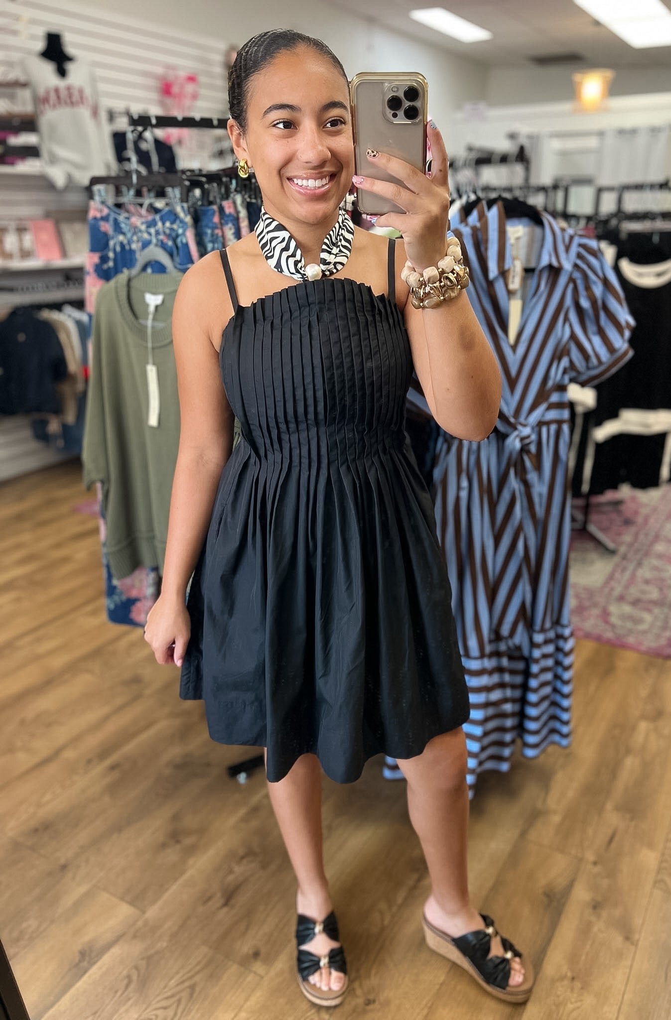 Entro black pleated bodice mini dress with adjustable spaghetti straps and full skirt