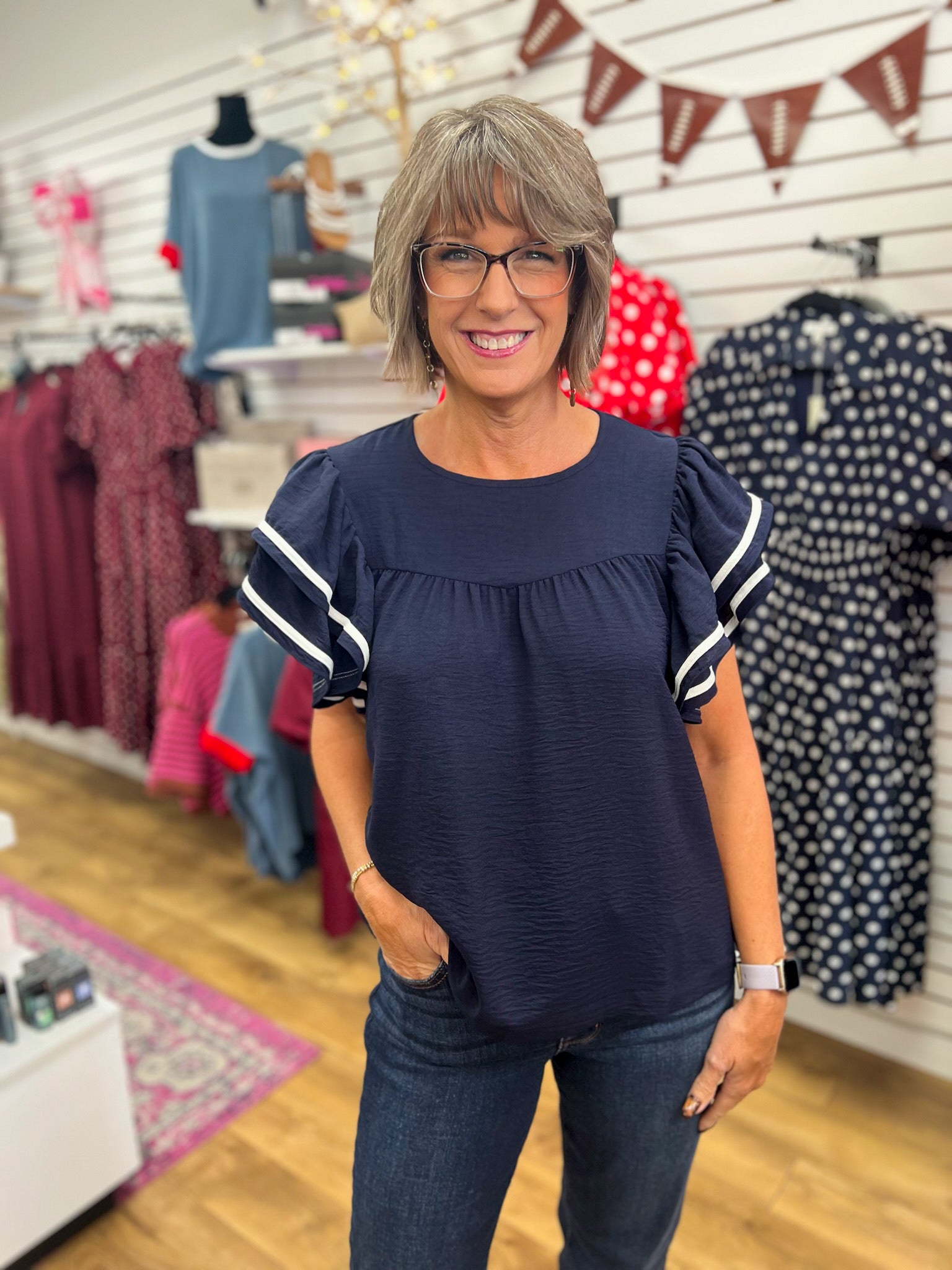 She + Sky navy ruffle short-sleeve top with white contrast piping trim