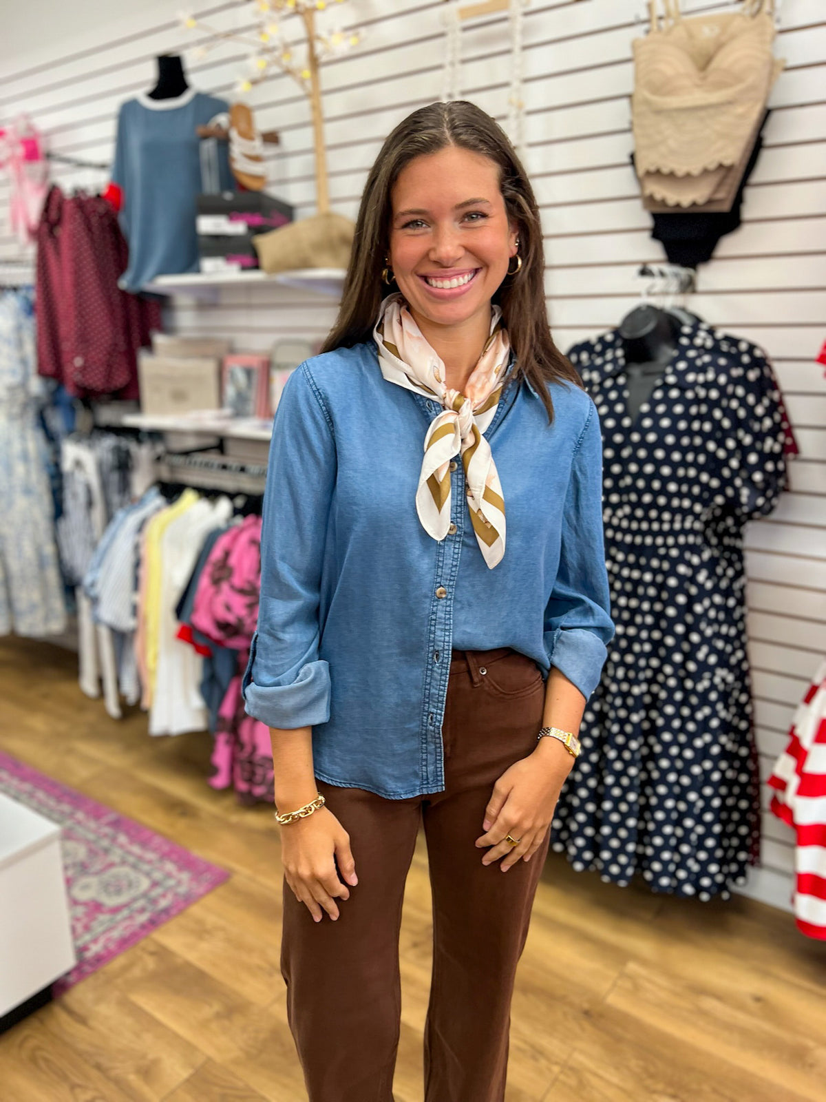 Blue chambray button-down top with collar, 3/4 tab sleeves, and neck scarf styling