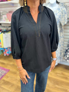 Umgee black textured V-neck top with gold trim detail and 3/4 balloon sleeves