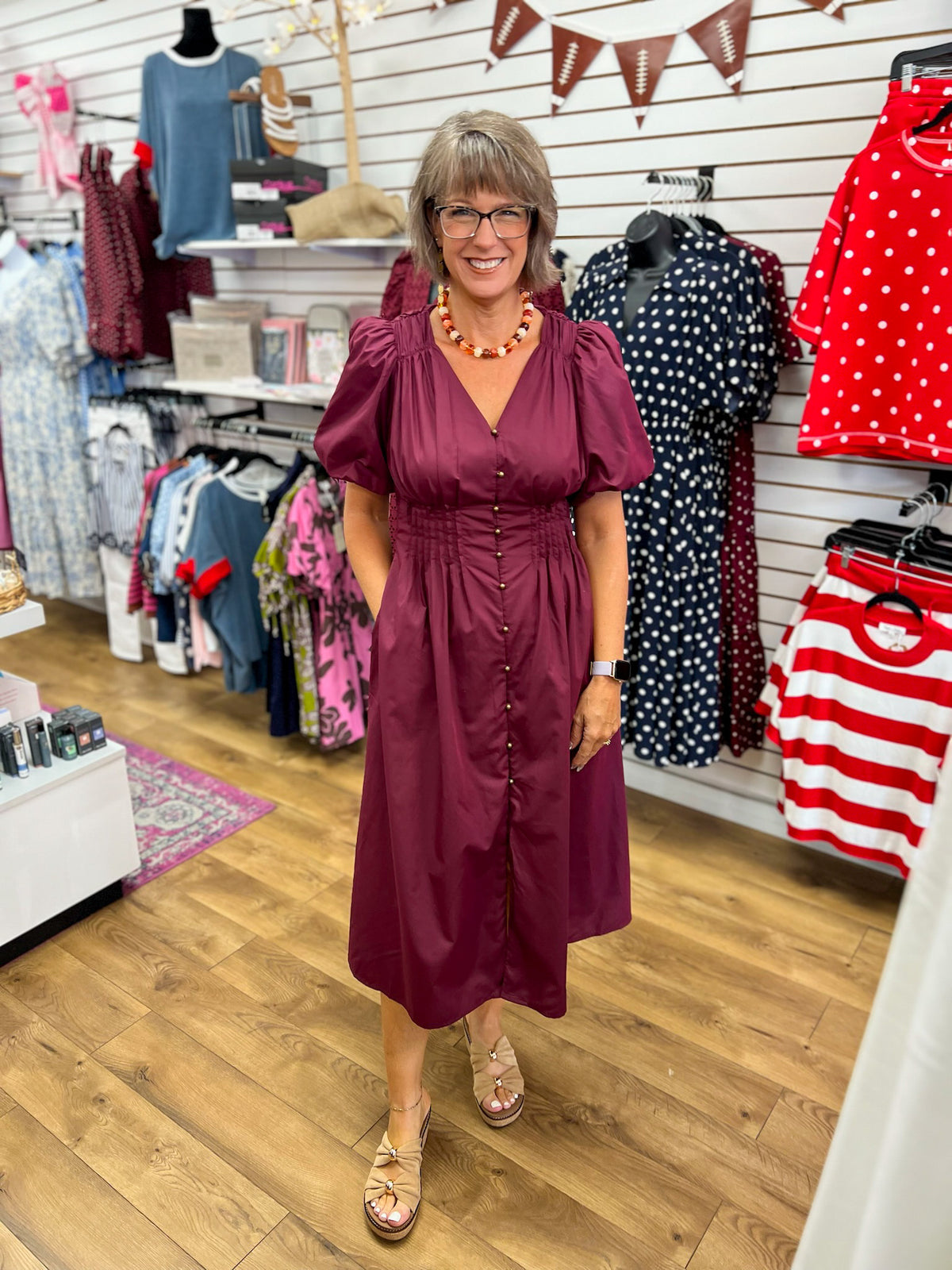 Wine midi dress with puff sleeves, gold buttons, smocked waist, and pockets